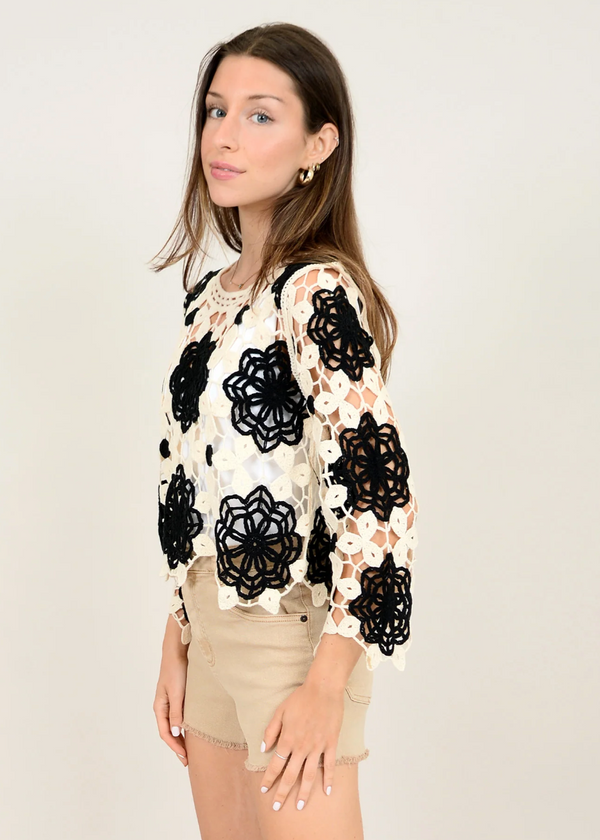 The Yenia Pullover in black and white
